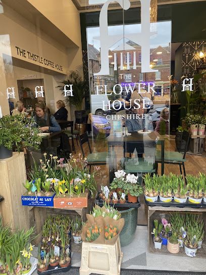 THE FLOWER HOUSE
