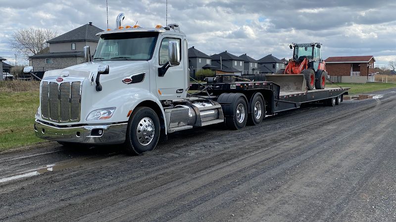 TRANSPORT ET REMORQUAGE Boucherville 24/7 Survoltage Déverrouillage Boost crevaison