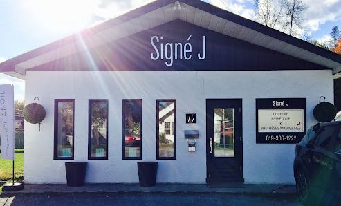 Signé J